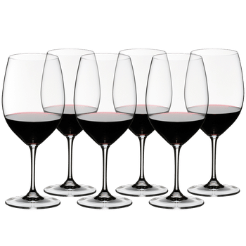 6 RIEDEL Vinum Cabernet Sauvignon/Merlot glasses filled with red wine stand slightly offset side by side
