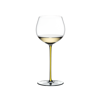 RIEDEL Fatto A Mano Oaked Chardonnay Yellow filled with a drink on a white background
