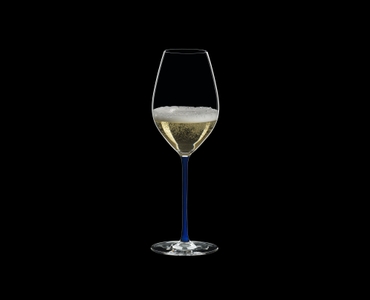 RIEDEL Fatto A Mano Champagne Wine Glass Dark Blue R.Q. filled with a drink on a black background