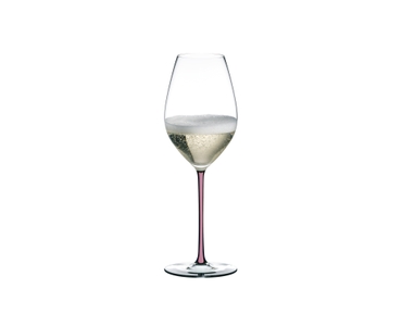 A RIEDEL Fatto A Mano Champagne Wine Glass in mauve filled with champagne on a transparent background. 