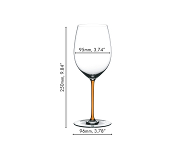 A RIEDEL Fatto A Mano Cabernet with an orange stem and filled with red wine on a white background.