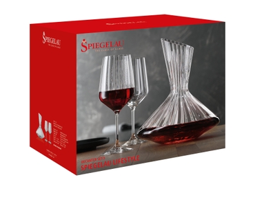 An unfilled Spiegelau Lifestyle Decanter next to an unfilled Lifestyle Red Wine Glass on white background with product dimensions