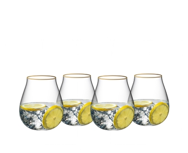RIEDEL Gin Set Limiterte Edition mit Gold Rand gefüllt mit einem Getränk auf weißem Hintergrund