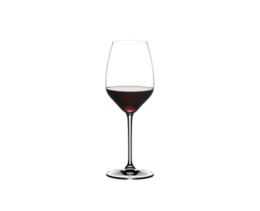 RIEDEL EXTREME RIESLING filled with a drink on a white background