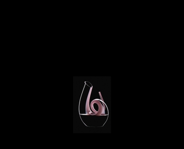RIEDEL Decanter Curly Pink R.Q. filled with a drink on a black background