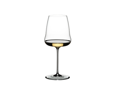 RIEDEL Winewings Chardonnay filled with a drink on a white background