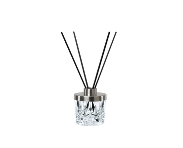 NACHTMANN Noblesse Spa Diffuser (incl. 8 aroma sticks) filled with a drink on a white background