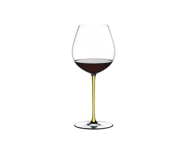 RIEDEL Fatto A Mano Pinot Noir Yellow filled with a drink on a white background