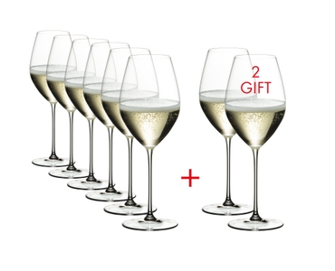 Six RIEDEL Veritas Champagne Wine Glasses plus two filled with champagne tand side by side or slightly behind each other on a white background.
