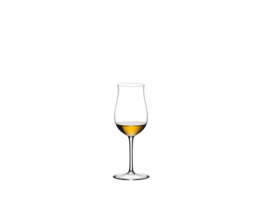 RIEDEL Sommeliers Cognac VSOP filled with a drink on a white background