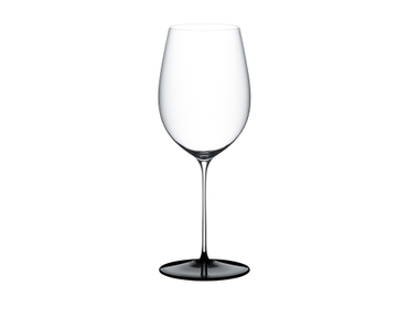 RIEDEL Fatto A Mano Black Tie Bordeaux Grand Cru filled with a drink on a white background