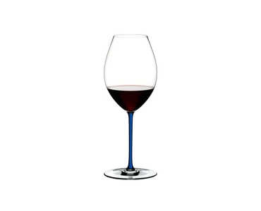 RIEDEL Fatto A Mano Syrah Dark Blue R.Q. filled with a drink on a white background