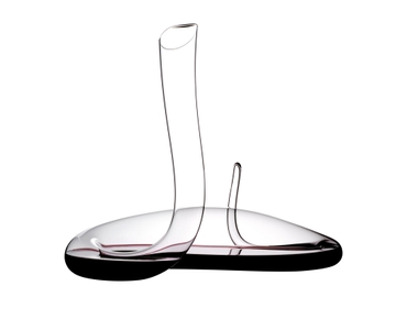 RIEDEL Decanter Mamba filled with a drink on a white background