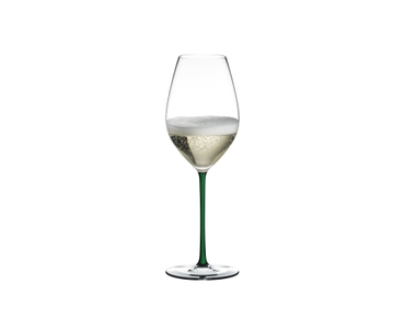 RIEDEL Fatto A Mano Champagne Wine Glass filled with a drink on a white background