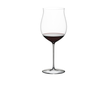 A RIEDEL Superleggero Burgundy Grand Cru glass filled with red wine on a transparent background.