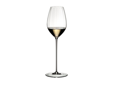 RIEDEL High Performance Riesling Clear filled with a drink on a white background