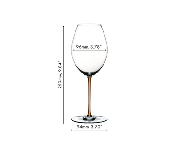 A RIEDEL Fatto A Mano Syrah with a orange stem and filled with red wine on a white background.