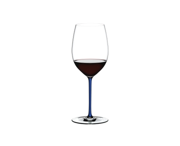 RIEDEL Fatto A Mano R.Q. Cabernet/Merlot Dark Blue filled with a drink on a white background