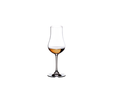 Four RIEDEL Rum glasses filled with rum side by side on a white background.