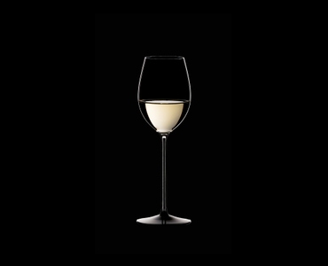 RIEDEL Sommeliers Black Tie Loire filled with a drink on a black background