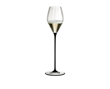 RIEDEL High Performance Champagne Glass Black filled with a drink on a white background