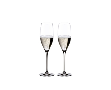 RIEDEL Vinum Cuvée Prestige filled with a drink on a white background