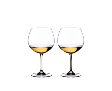 RIEDEL Vinum Oaked Chardonnay/Montrachet filled with a drink on a white background