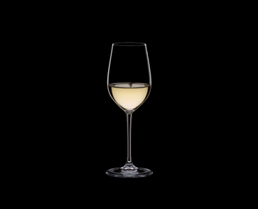 RIEDEL XL Restaurant Riesling Grand Cru filled with a drink on a black background