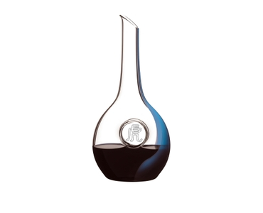 A RIEDEL Chinese Zodiac Tiger Decanter Blue filled with red wine on a transparent background.