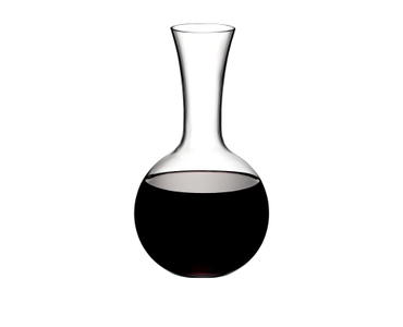 RIEDEL Decanter Syrah Magnum filled with a drink on a white background