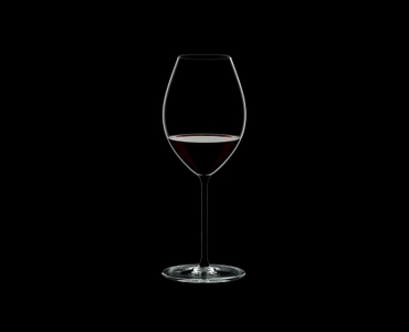 RIEDEL Fatto A Mano Syrah Black filled with a drink on a black background