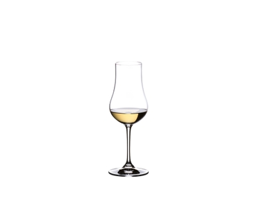 RIEDEL Vinum XL Aquavit filled with a drink on a white background