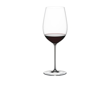 RIEDEL Superleggero Bordeaux Grand Cru filled with a drink on a white background