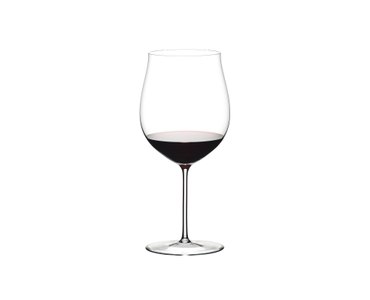 RIEDEL Sommeliers Burgundy Grand Cru filled with a drink on a white background
