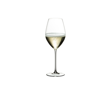 Six RIEDEL Veritas Restaurant Champagne Wine Glasses filled with champagne tand side by side or slightly behind each other on a white background.