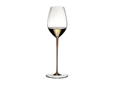RIEDEL High Performance Riesling Gold filled with a drink on a white background