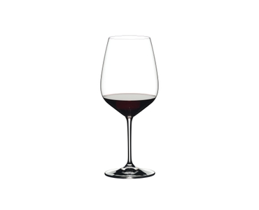 RIEDEL Heart To Heart Cabernet Sauvignon filled with a drink on a white background