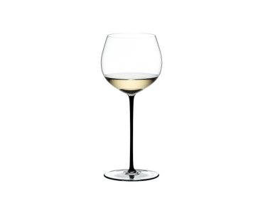 RIEDEL Fatto A Mano Oaked Chardonnay Black filled with a drink on a white background