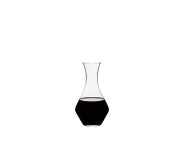 RIEDEL Cabernet Decanter filled with a drink on a white background