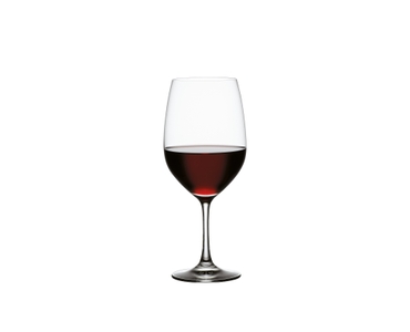 SPIEGELAU Vino Grande Bordeaux filled with a drink on a white background