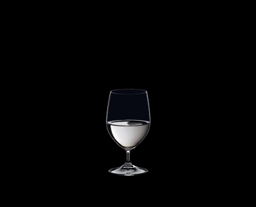 RIEDEL Ouverture Water filled with a drink on a black background