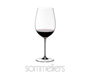 RIEDEL Sommeliers Bordeaux Grand Cru filled with a drink on a white background