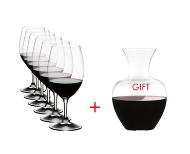 RIEDEL Ouverture + Gift filled with a drink on a white background
