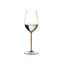 A RIEDEL Fatto A Mano Riesling/Zinfandel glass in orange filled with white wine on a transparent background. 