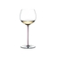 A RIEDEL Fatto A Mano Oaked Chardonnay glass in pink filled with white wine on a transparent background. 