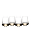 Four SL RIEDEL Stemless Wings Aromatic White Wine/Champagne Wine Glasses filled with white wine on a transparent background. 