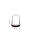 A SL RIEDEL Stemless Wings Cabernet/Merlot glass filled with red wine on a white background. 