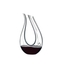 RIEDEL Amadeo Fatto A Mano Decanter filled with a drink on a white background