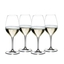 RIEDEL Vinum Champagne Wine Glass filled with a drink on a white background