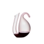 RIEDEL Ayam Decanter - rosa filled with a drink on a white background